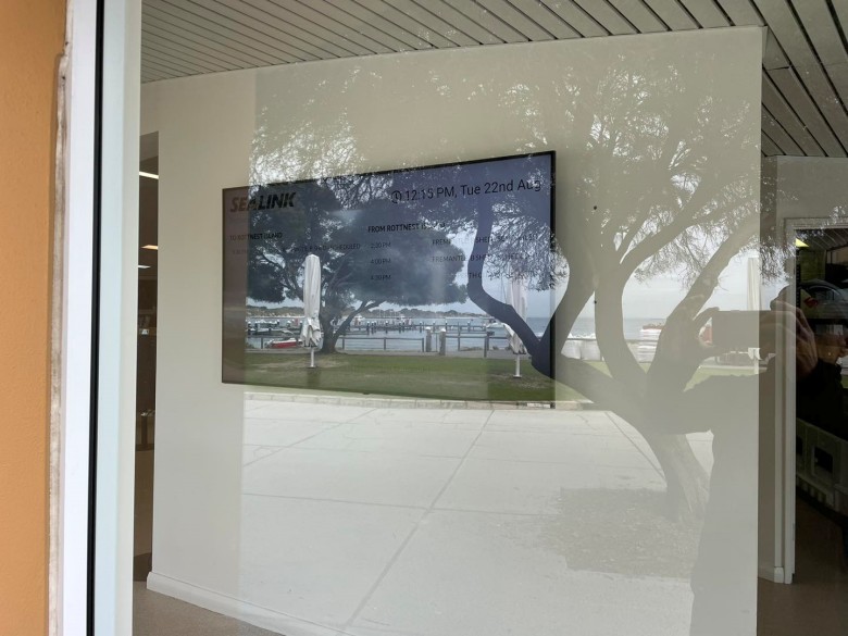 LG 75” TV wall mounted in the window of the rottnest island visitor centre