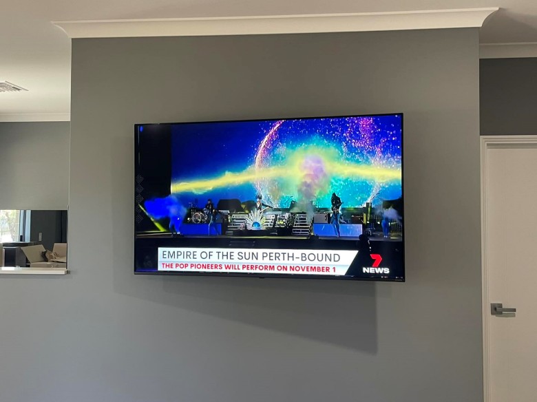 LG 65” TV mounted with Sanus VLT7 bracket