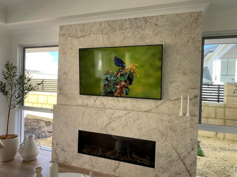 tv installation on a large single porcelain wall tile in iluka